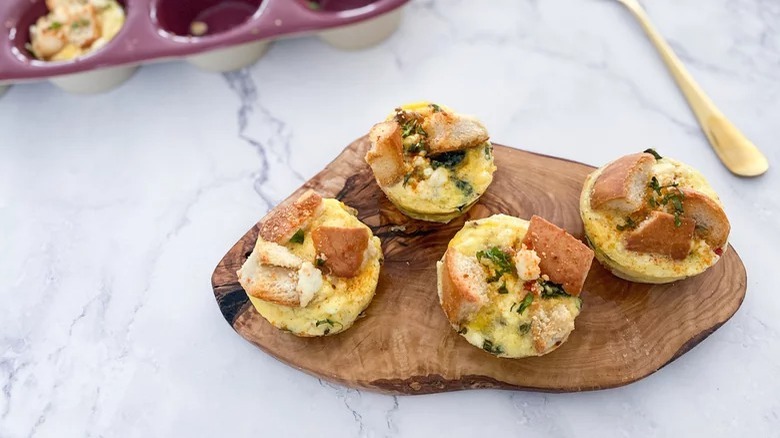 wooden platter with egg casserole bites