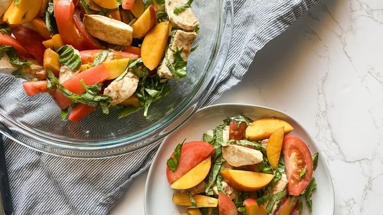 bowl and plate of peach caprese salad