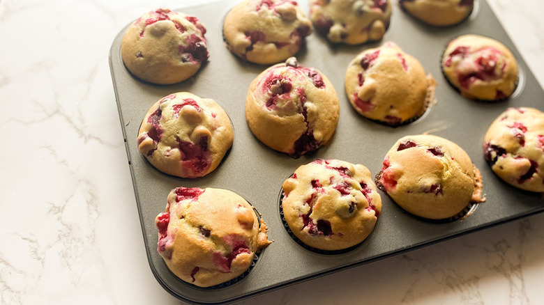 cranberry muffins in pan