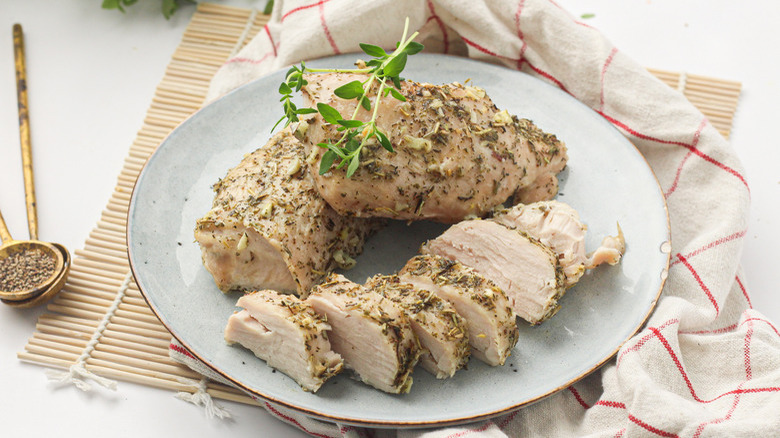 sliced turkey tenderloin on plate