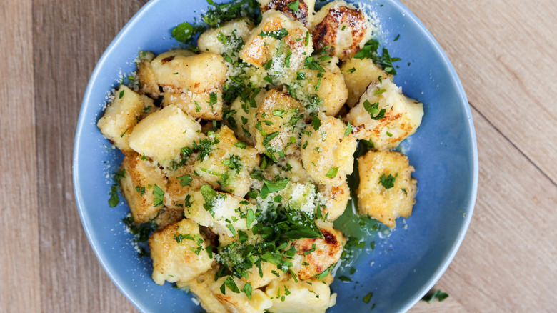 gnocchi with parsley in bowl