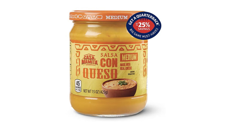 glass jar of salsa con queso medium dip made with real cheese available at Aldi