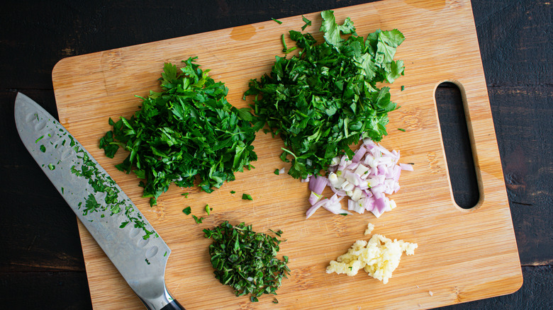 Cutting board and knife with herbs