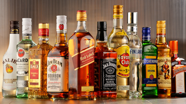 Assorted whiskey bottles on counter