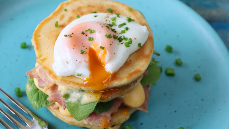 A plate of savory pancakes on a blue plate