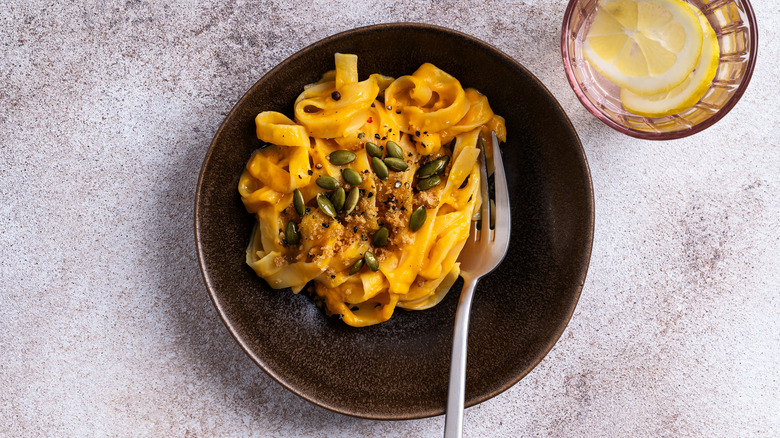 Pasta in pumpkin sauce on a plate