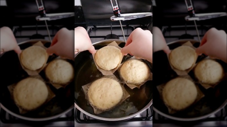 frying doughnuts in hot oil