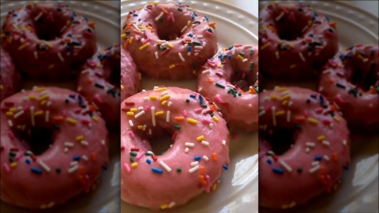 pink glazed doughnuts with sprinkles