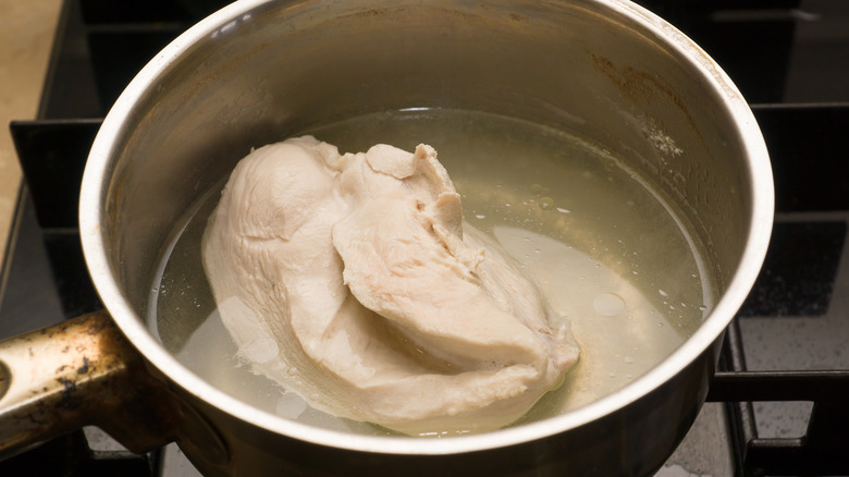 pot with boiling chicken