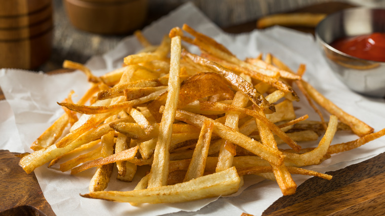 Shoestring fries on parchment