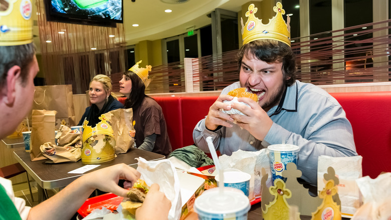 Customer eating Burger King