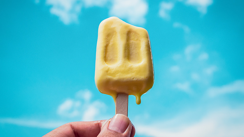 Melting ice popsicle in sky