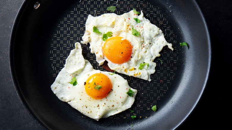 fried eggs in nonstick pan