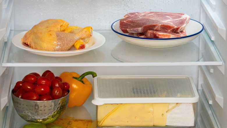 chicken and steak on plates