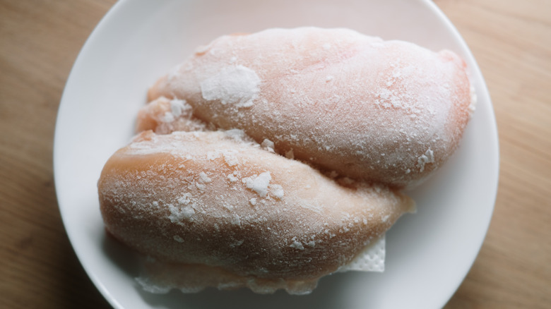 frozen ch icken breast on dish