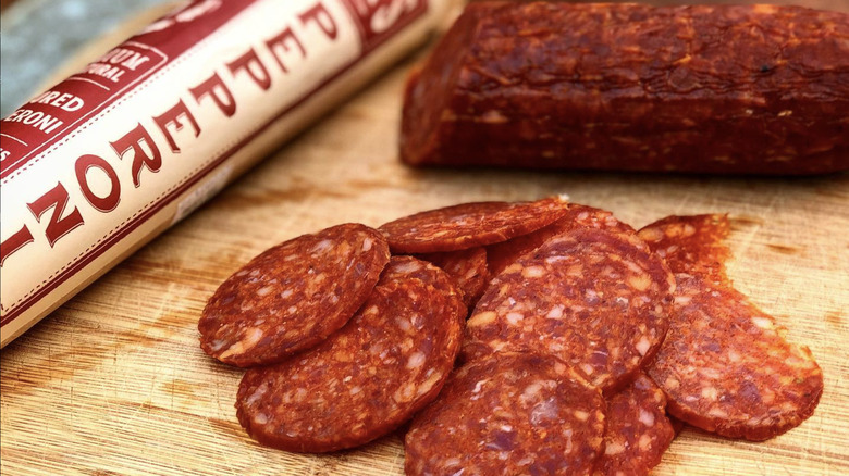 Slices of pepperoni on cutting board