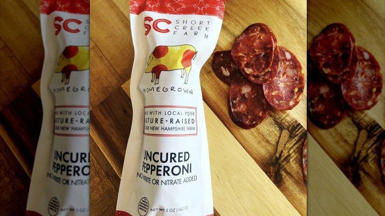 Package of Short Creek Farm pepperoni with sliced pepperoni on the side