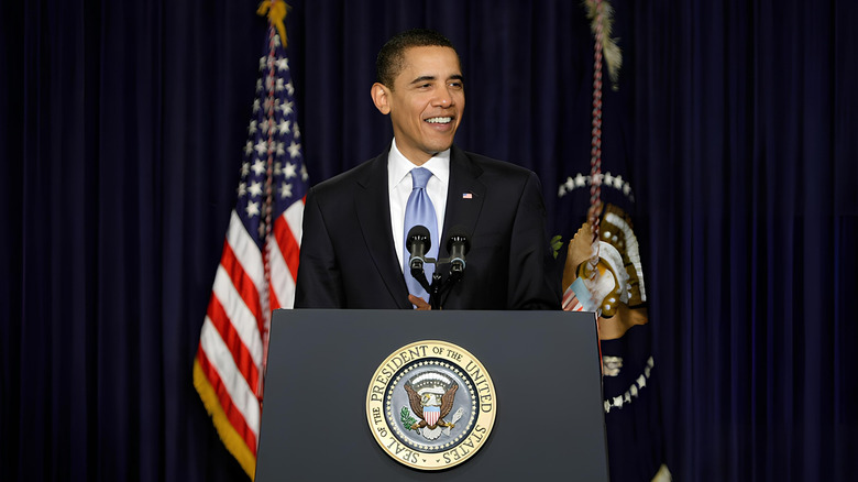 Barack Obama standing at a podium