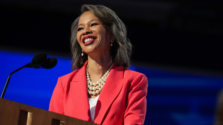 Lisa Blunt Rochester smiling at podium