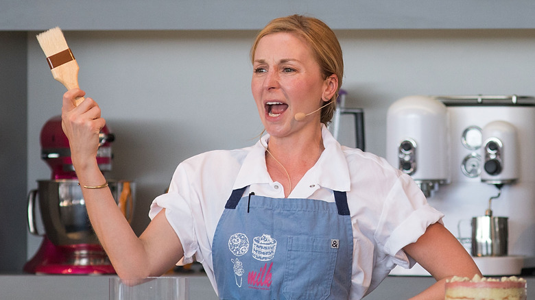 Christina Tosi gesticulating in show kitchen