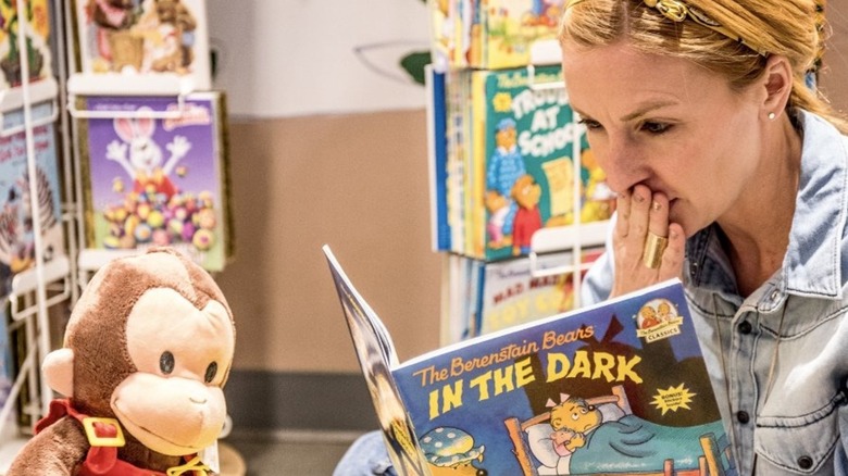 Christina Tosi reading a children's book