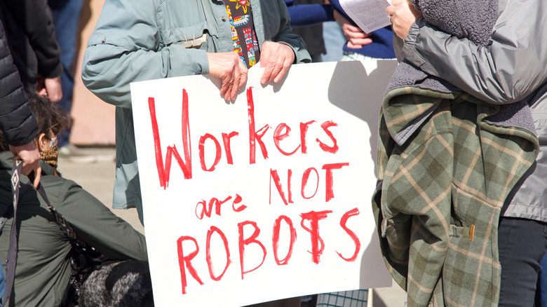 workers protesting outside Whole Foods