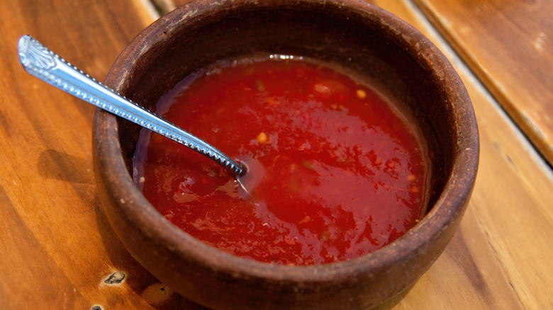 bowl of red hot sauce