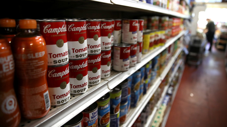 A shelf of Campbell's soup