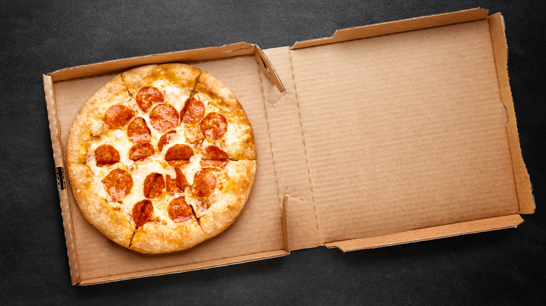 pizza in cardboard box 