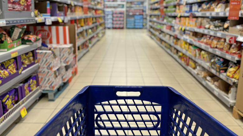 Shopping cart in aisle