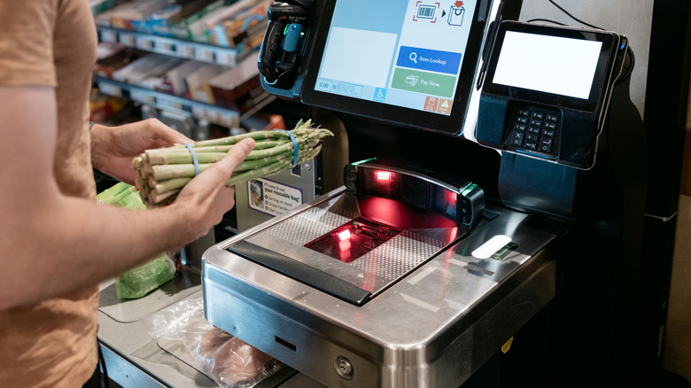 Self-checkout station in grocery store