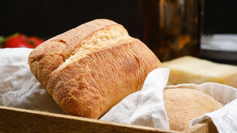 Ciabatta buns on linen-lined basket