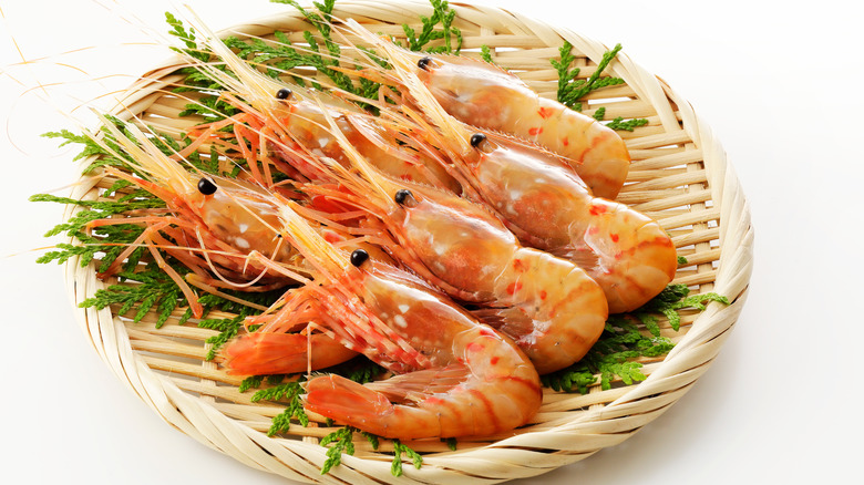 Spot shrimp on a bamboo colander