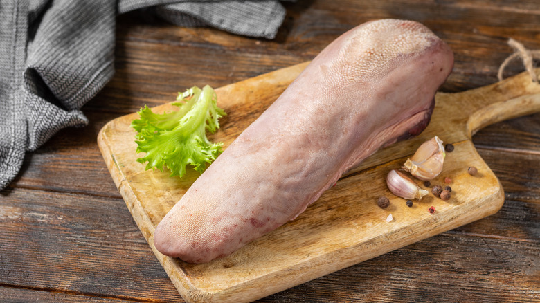 Beef tongue on a board