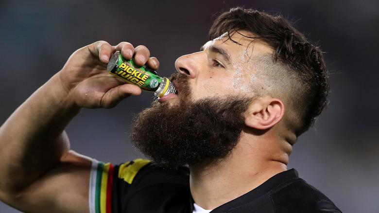 rugby player drinks pickle juice