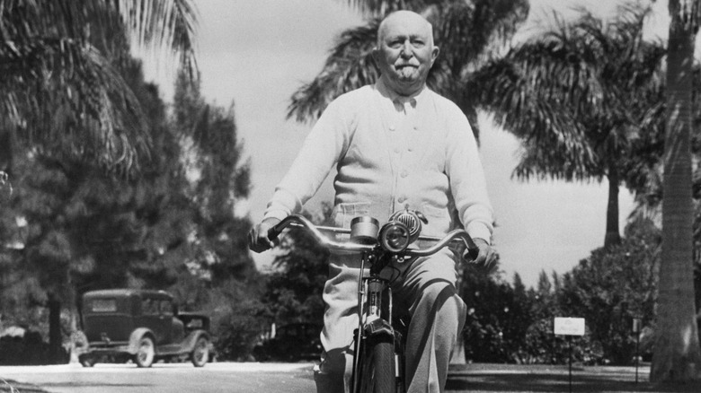 John Kellogg riding a bike