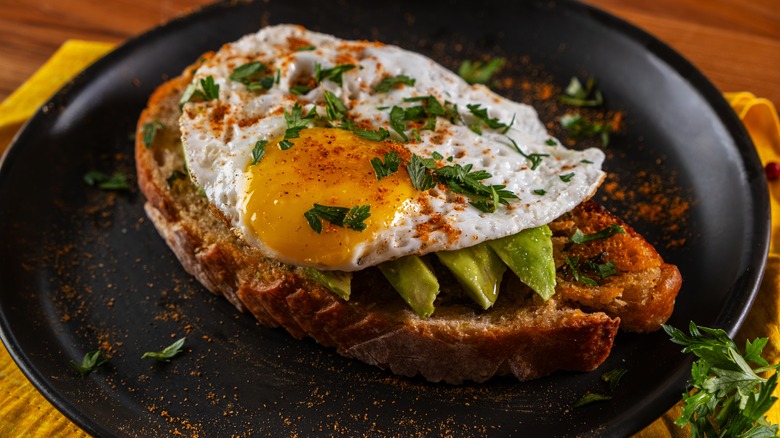 fried egg and avocado on toast