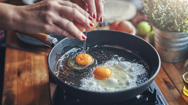 eggs frying in pan