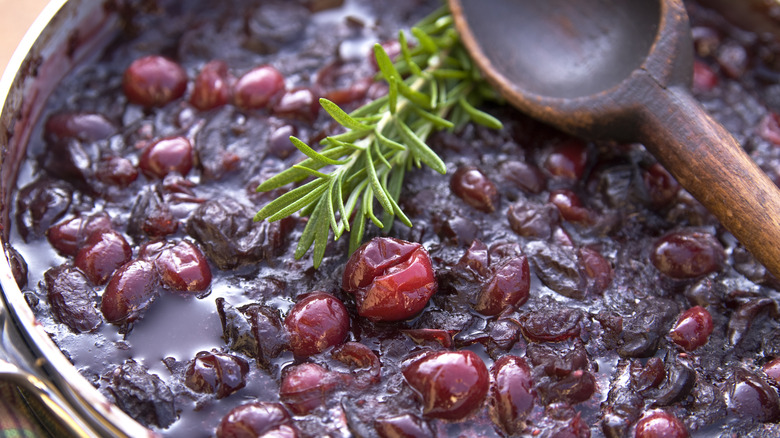 fresh rosemary in cranberry sauce