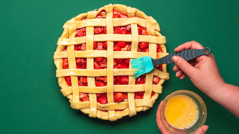 giving pie an egg wash