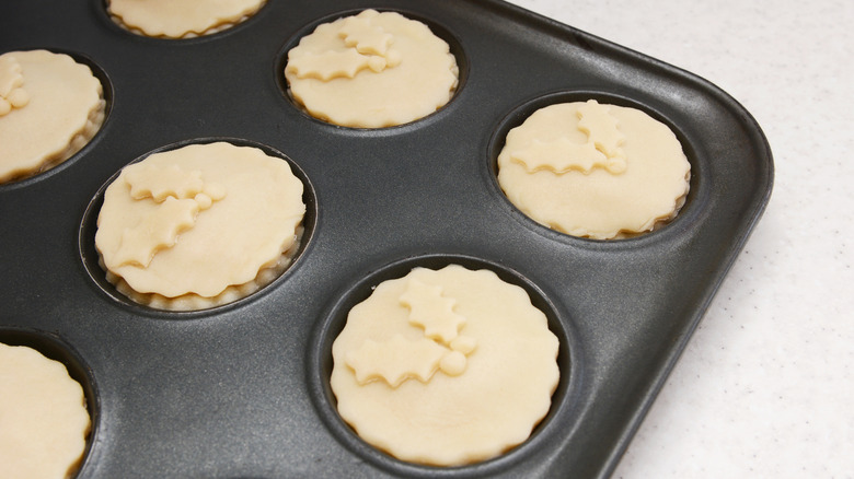 mini pies with holly leaf lids