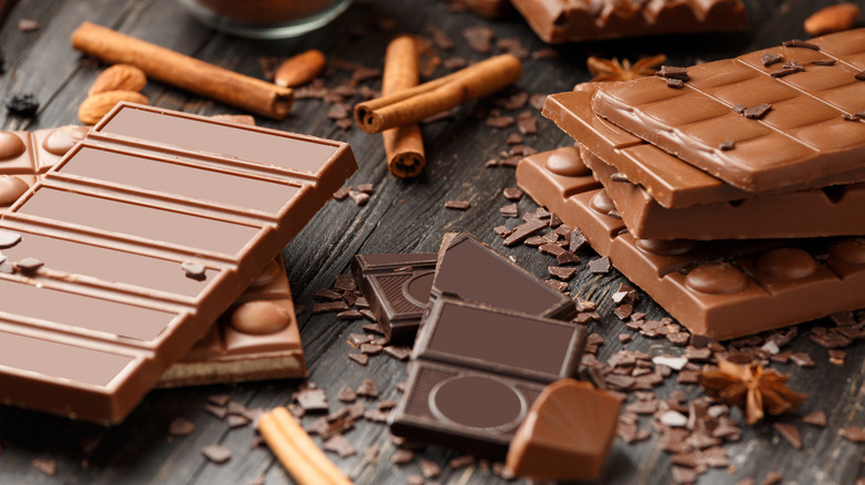 chocolate bars and cinnamon sticks on counter