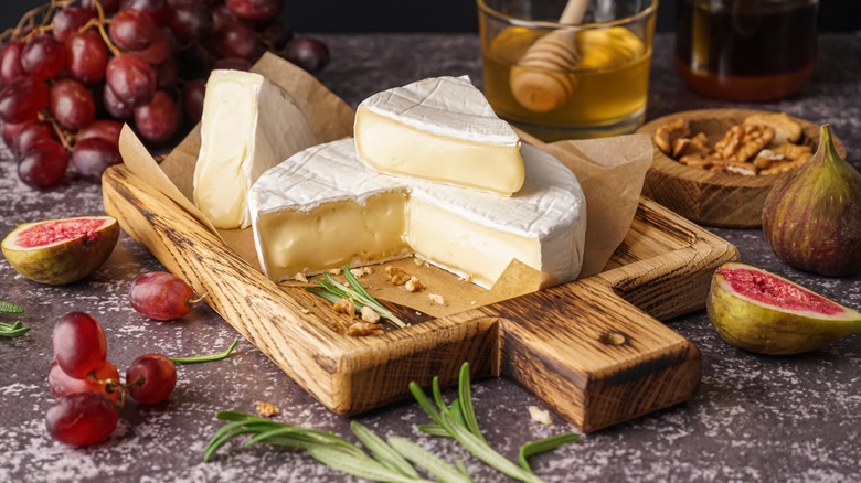 cheese board with grapes and figs and nuts