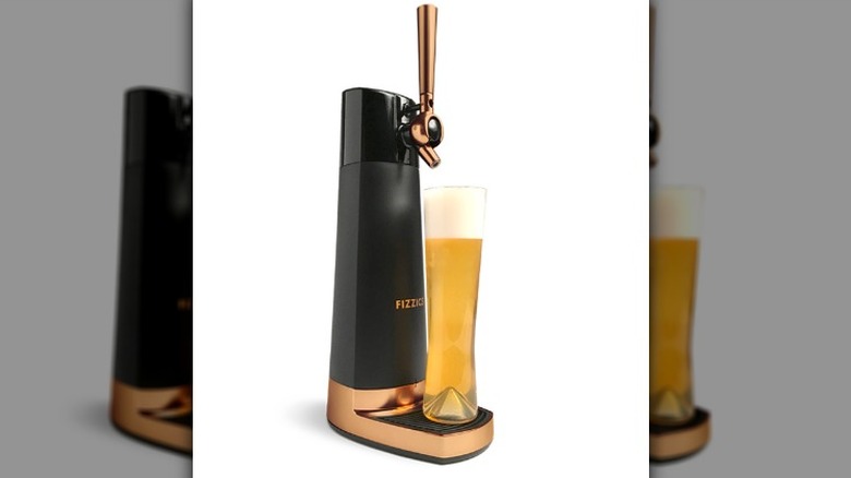 home beer dispenser and glass