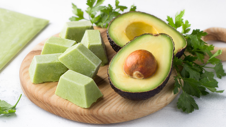 frozen avocado chunks on wood