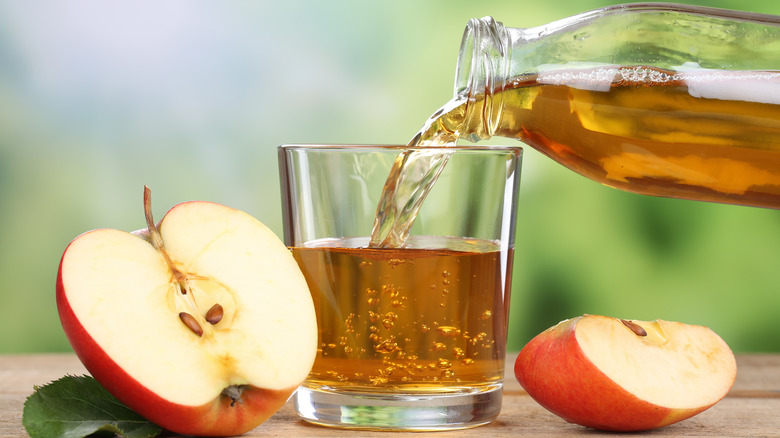 apple juice poured in glass