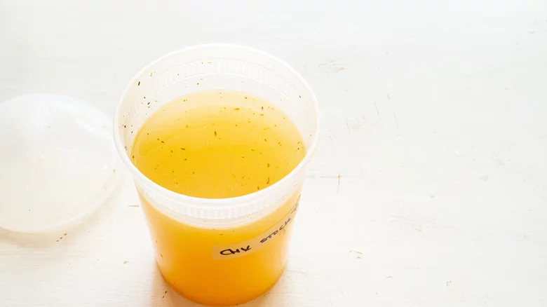 quart container of chicken stock
