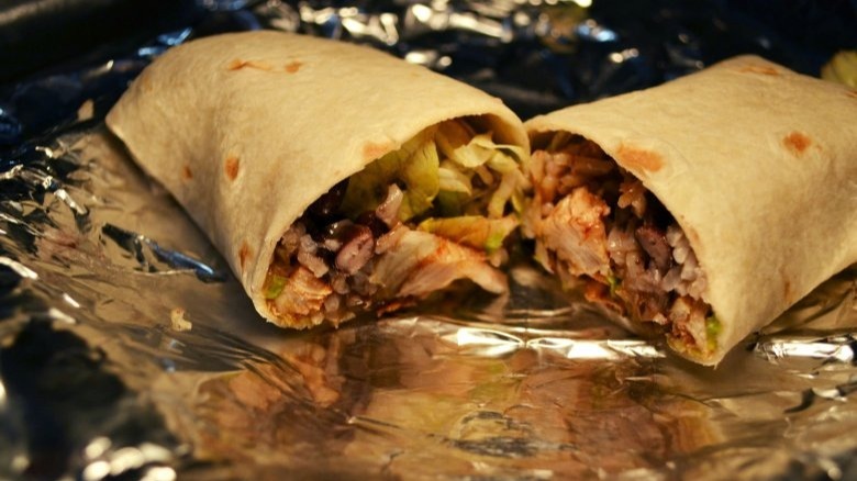 rice-filled burrito on foil