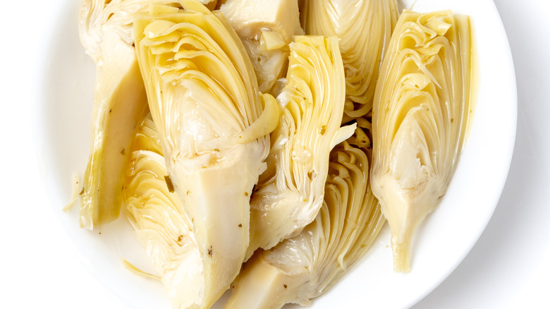 quartered artichoke hearts on plate