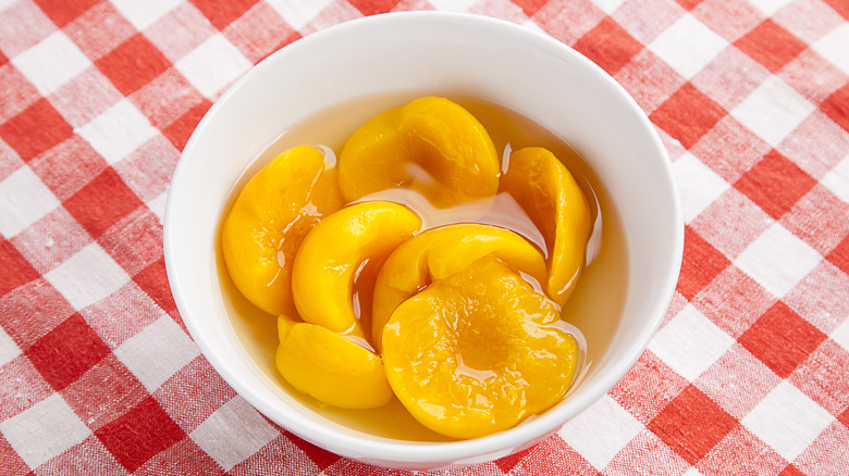 bowl of canned peach halves